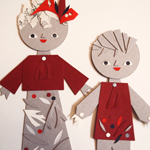 En la imagen gráfica del taller. Dos figuras de cartón de Hansel y Gretel realizados por Blanca Helga